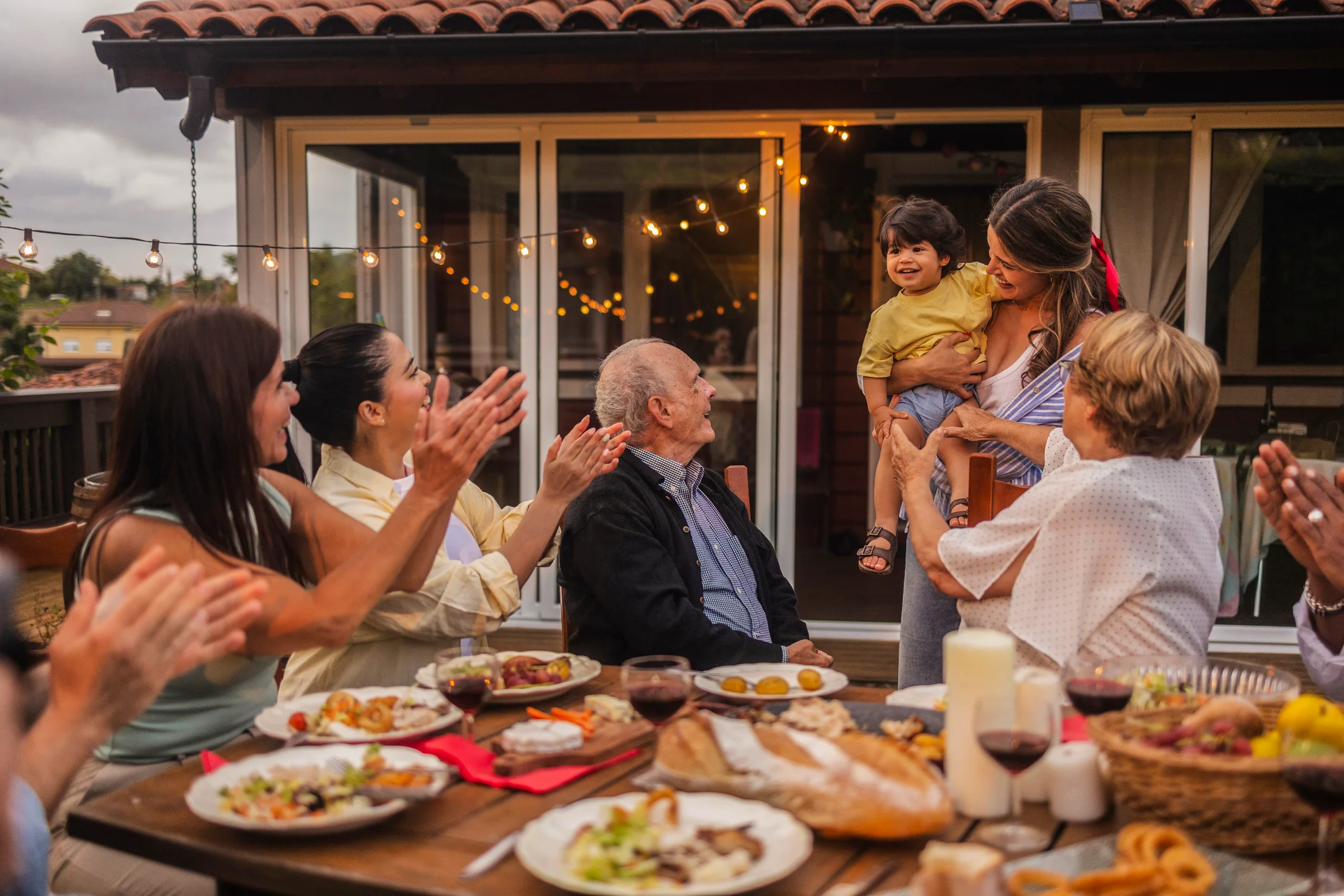 Multi-generational family together outdoors